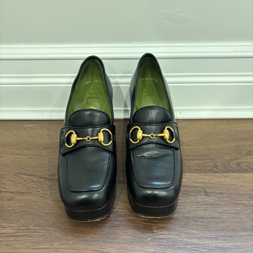 Gucci Black Loafers with Gold Buckle Detail